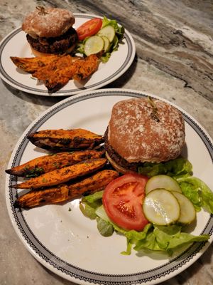 Mushroom Swiss burgers with sweet potato wedges. Whole Food Plant Based  No Oil at Nutrition Elite in Naples