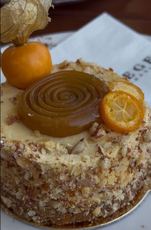 Carrot cake with exotic fruit mousse  at Apátsági Rege Cukrászda in Tihany