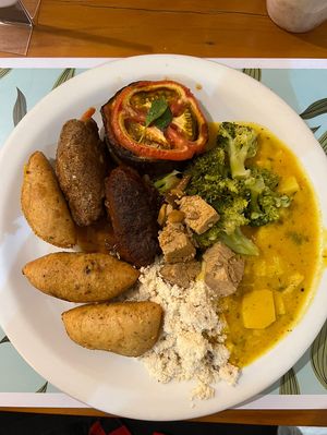 Pastel, moqueca de banana da terra, farofa  at Bardana Cozinha Natural - Av Ayrton in Rio De Janeiro