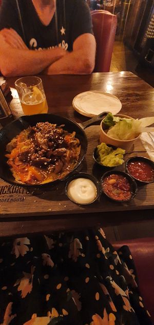 Sizzling fajitas: Smoky sticky Aubergine with toasted sesame seeds at Hickory's Smokehouse in Wilmslow