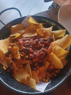 Spicy bean nachos (ask for no cheese or sour cream) at Hickory's Smokehouse in Wilmslow