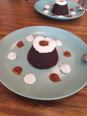 Chocolate souffle. Perfectly executed.  Salted caramel blobs oit of this world.   at Le Jardin in Biarritz