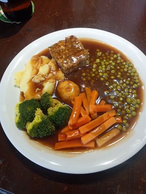 Veg, onion gravy, stuffing. Sauces available. This is the vegan one - vegetarian has a Yorkshire pudding. Decent! But I'd recommend the pub as a music one, not primarily for food. at The Black Bull in Gateshead