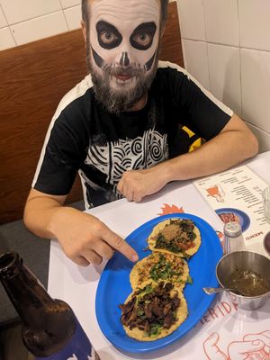 Tacos and a skeleton at Taqueria De La Union in Merida