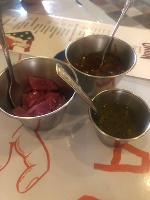 Salsas and onions at Taqueria De La Union in Merida