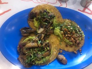 Mushroom and garlic tacos with corn and guacamole tacos. $33 pesos each.  at Taqueria De La Union in Merida