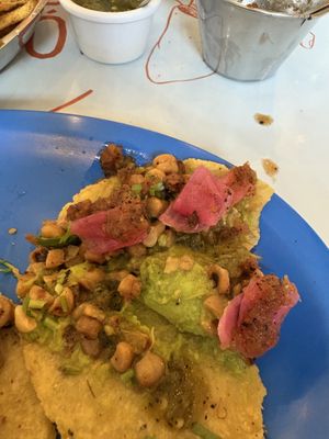 Guacamole con Maíz taco with added onion and salsa   at Taqueria De La Union in Merida