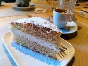 Cake of the day with sweet cream in the middle. at Rutz in Somma Lombardo