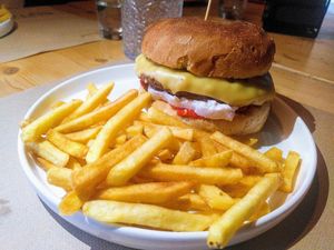 Burger of the day, with vegan mozzarella, and fries. at Rutz in Somma Lombardo