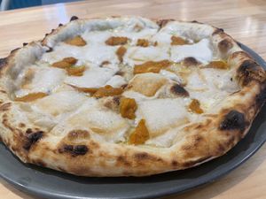 12” vegan four cheese pizza, 380 baht (plus 7% tax)  at Vegano in Bangkok