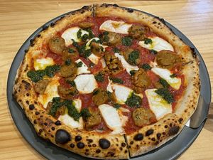 12” vegan Thai spicy chorizo pizza, 380 baht (plus 7% tax)  at Vegano in Bangkok