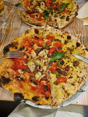 Pizza Primavera and Pizza Puttanesca at Con Gusto - Schmiede Wiedikon in Zurich