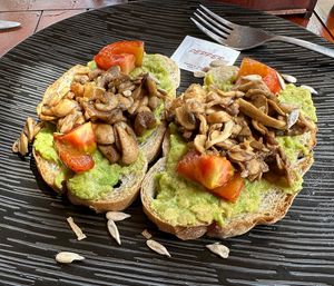 Avocado & mushroom toast  at Cookies Coffee Shop and Foods in Lembongan