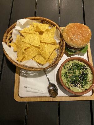 Burger with guacamole  at Carob Restaurant in Amman