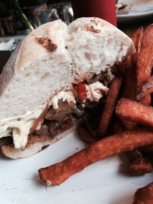 veganized house made pepper steak with sweet potato fries at The Cafe in Key West
