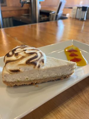 Vegan key lime cheesecake with pineapple sauce on the side at The Cafe in Key West