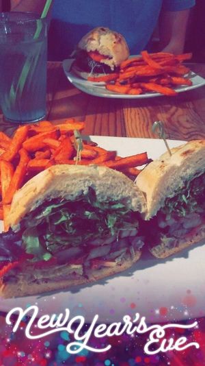 Artichoke Sandwhich and Veggie burger with sweet potatoe fries at The Cafe in Key West