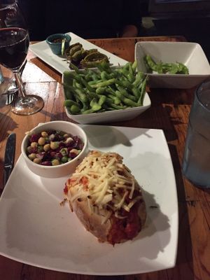 „meatball“-sandwich with vegan cheese, dumplings (veganized) & edamame at The Cafe in Key West