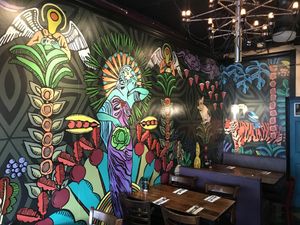 Two dinning areas. Both are very colorful   at The Cafe in Key West