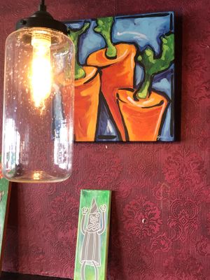 A colorful and funky decor welcomes you at The Cafe in Key West