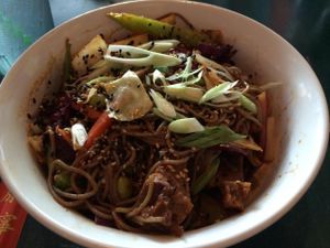 Soba noodle stir-fry with homemade seitan in a spicy Sriracha sauce at The Cafe in Key West