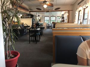 Inside dining area.  Lots of surf boards and pelicans. at Bella Vida Cafe in West Cape May