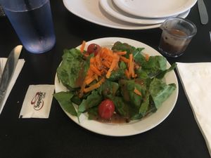Side salad (add on for 2.50). Sugar packet for size reference at Bella Vida Cafe in West Cape May