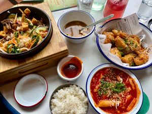 Bibimbap, tteokbokki, and fried cauliflower/tofu at Kkokki Vegan House in Hamburg