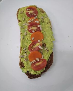 Torrada de Aguacate, pickless, cherry y semillas at Organic Ume in Barcelona