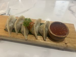 Dumplings and good dipping sauce   at Plant Based in 