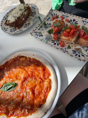 Pizza, bruschetta and lasagne. We were way too full to eat it all haha at Humus Vegan Tenerife in Tenerife