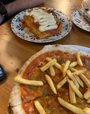 Lasaña de ragú y bechamel y pizza de kebab   at Humus Vegan Tenerife in Tenerife