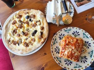 Mozzarella Pizza with mushrooms and sausages and  Lazanja at Humus Vegan Tenerife in Tenerife
