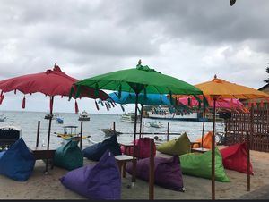 Outdoor seating   at Cafe Papa John Bar & Restaurant in Karangasem