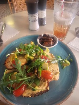 Dried out avo on toast with world's smallest portion of mushrooms at Bloom in Grand Baie