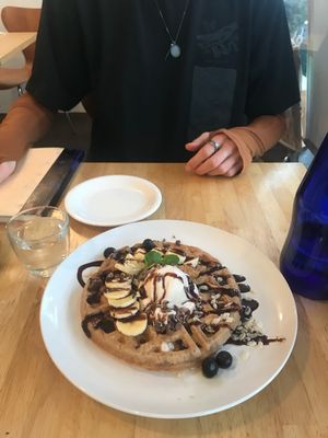 incredible pb raw chocolate waffle with blueberries and soy ice cream  at Raw8 Cafe in Osaka