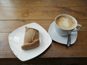 Wholewheat empanada and latte (3500CLP total)  at TierraLibre in Santiago