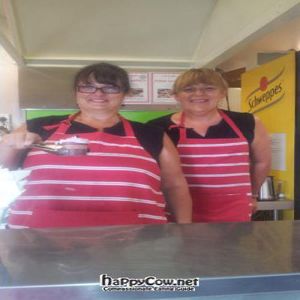 Kate & I posing behind the counter. I'm the one with the cake :-) at Vegelicious in Moonah