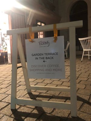 Terrible picture of the Filteraj swing sign board outside the cafe at night. But it easy to walk past the door! at Filteraj Specialty Coffee & Shop in Zagreb