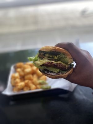 Pesto burger  at Plantiful Superfoods in Seattle