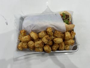 Banh mi + Tater tots  at Plantiful Superfoods in Seattle