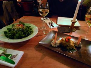 Starters: Seasonal green salad (Feldsalat) on the left, and cashew creamcheese with vegetables on the right. at Körle und Adam in Stuttgart