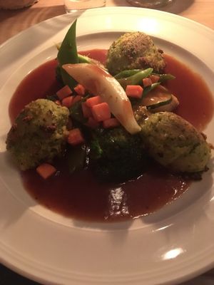 Potato and polenta croquettes with veggies and red wine sauce at Körle und Adam in Stuttgart