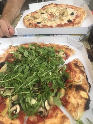 With rocket lettuce is the vegan Dita. The cheesy one is the vegetarian Zelda. Both very tasty.  at La Belle Epoque in Rognes