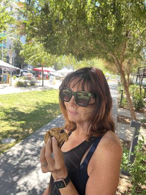 Grandma eating a drunken grandma cookie!  at Maya's Cookies in San Marcos