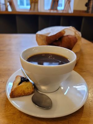 Prune pastry (vegan) with americano at Massolit Bakes in Krakow