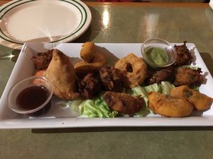 Vegetable appetizer platter with pakoras, samosas, tikki, yum (this is veggie, not vegan) at Dosa-N-Curry in Somerville