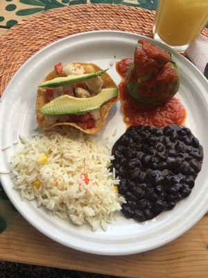Stuffed courgette, cauliflower ceviche, rice and beans at Puerto Verde in Puerto Morelos
