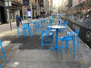 Outdoor seating in mall I front of venue at PLNT Burger - NoMad in New York City