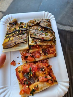 Aubergine abd tomatoe slices at Alice Pizza in Milan